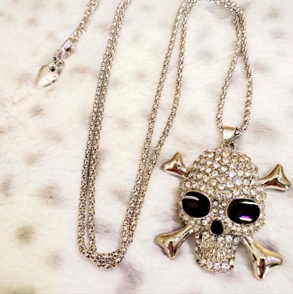 Silver plated crystal skull and crossbones necklace